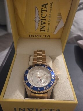 Invicta Men’s Gold Tone GMT Watch with Blue Bezel